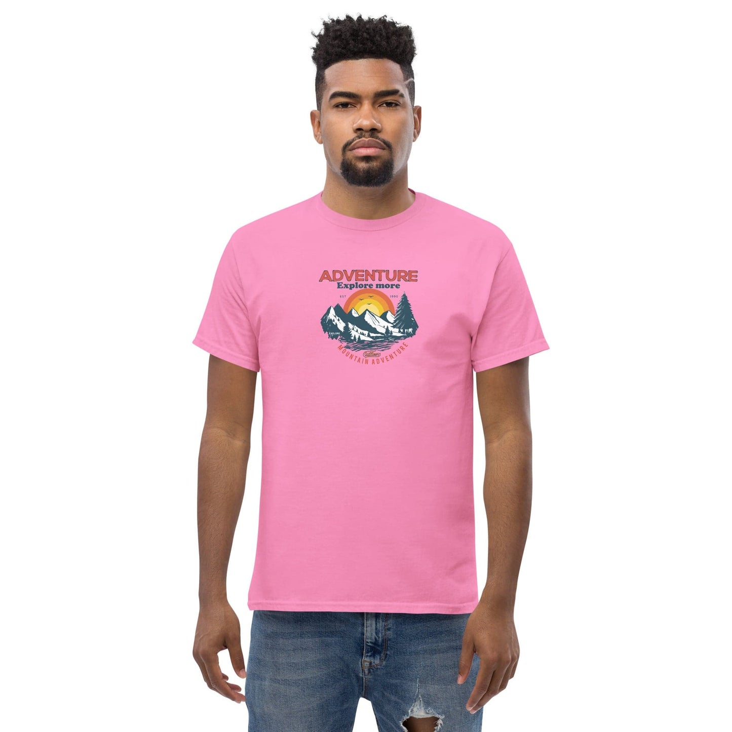 Pink t-shirt with mountain graphic.
