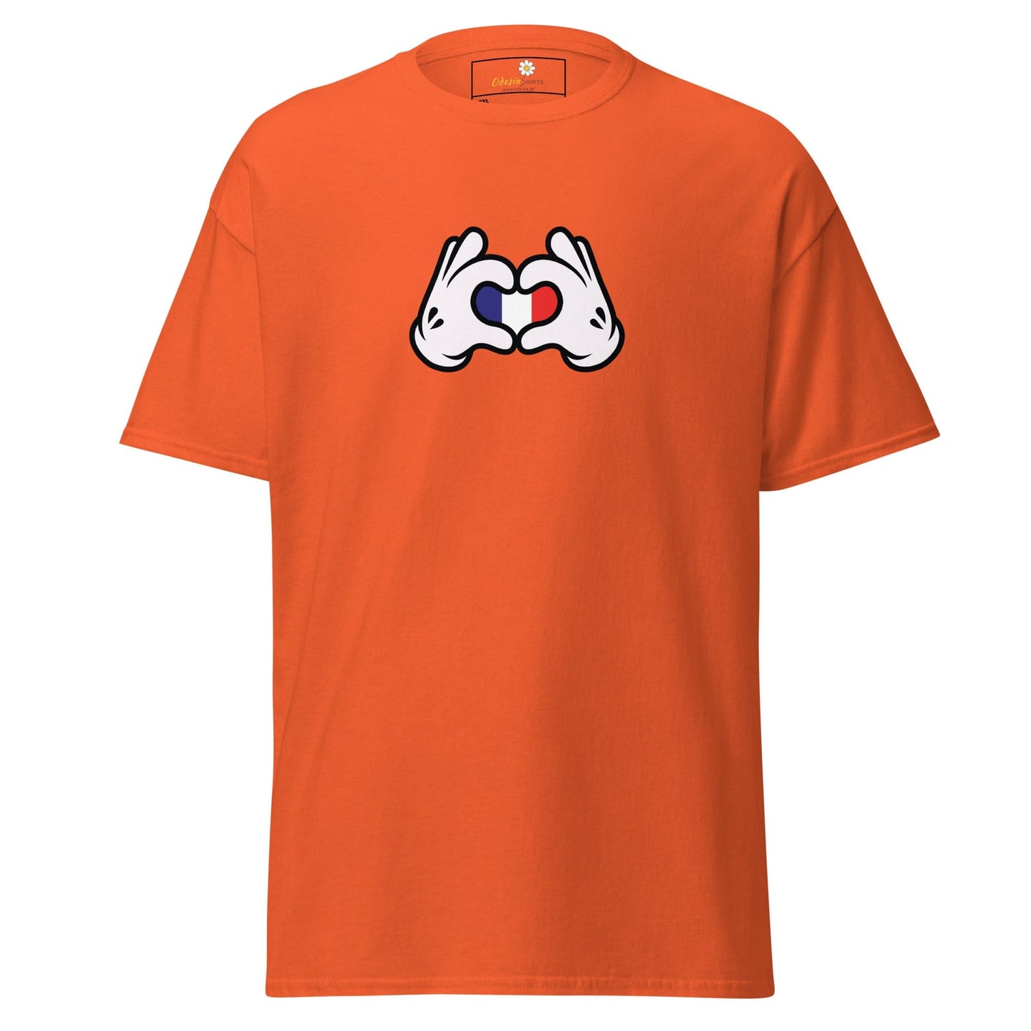 Orange t-shirt with heart-shaped hand graphic.